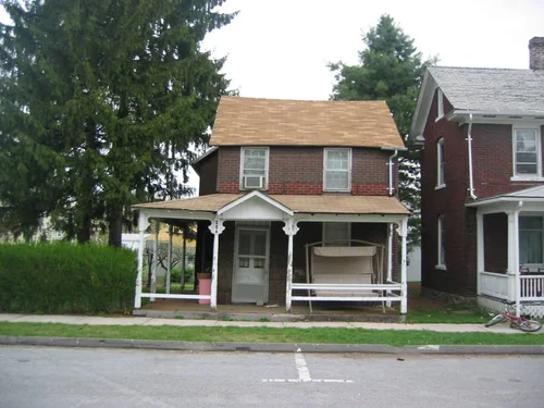 The original 1857 red-brick house at 204 Market Street before its transformation